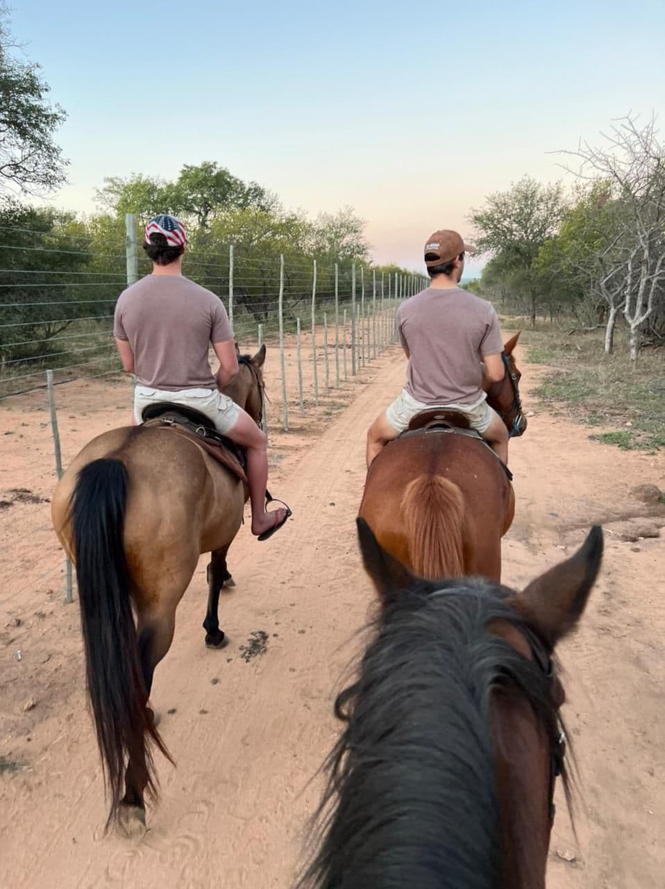 Three riders following the trail